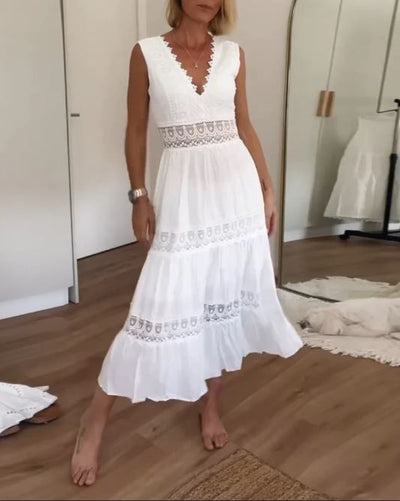 Sleeveless lace dress with V-neckline