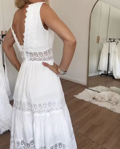 Sleeveless lace dress with V-neckline