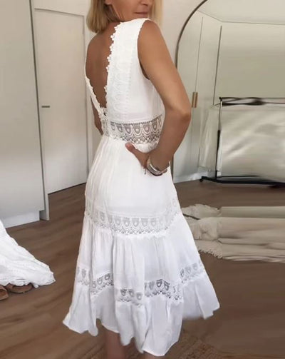 Sleeveless lace dress with V-neckline